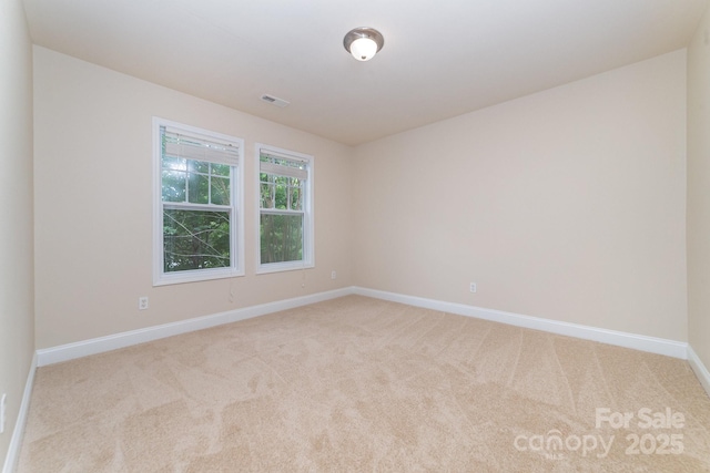 9836 Coatbridge Dr NW, Charlotte, NC 28269 - empty room with carpet and baseboards