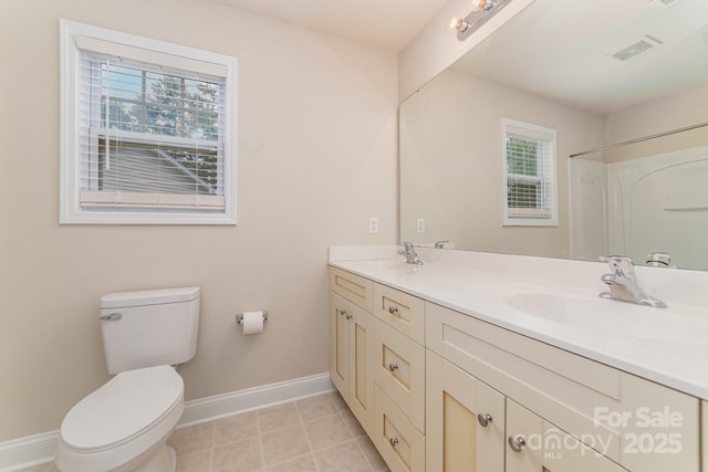 9836 Coatbridge Dr NW, Charlotte, NC 28269 - bathroom featuring plenty of natural light, double vanity, and a shower
