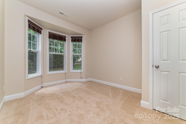 9836 Coatbridge Dr NW, Charlotte, NC 28269 - unfurnished room featuring carpet flooring