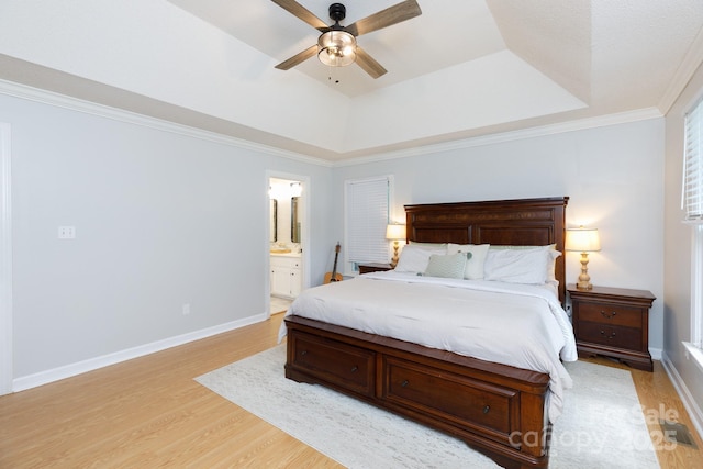 1631 Amanda Ln, Rock Hill, SC 29730 - bedroom featuring light wood-style flooring, a raised ceiling, ensuite bath, crown molding, and ceiling fan