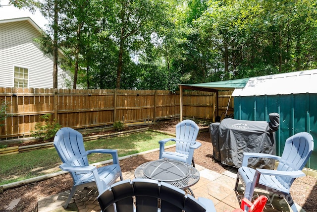 1631 Amanda Ln, Rock Hill, SC 29730 - fenced backyard with an outdoor fire pit and a patio