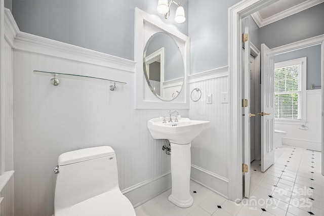20308 Ridgebrook Ln, Locust, NC 28097 - half bathroom with a wainscoted wall, crown molding, and tile patterned flooring
