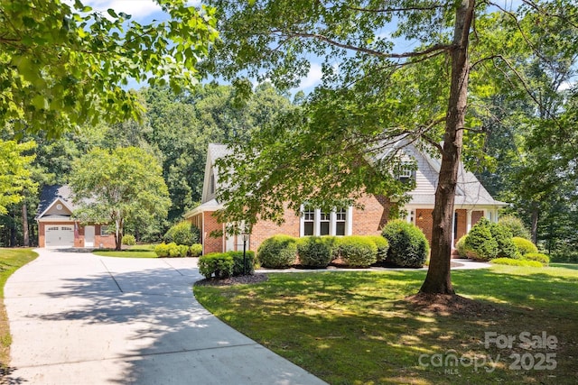 20308 Ridgebrook Ln, Locust, NC 28097 - view of property hidden behind natural elements with concrete driveway, brick siding, and a front lawn
