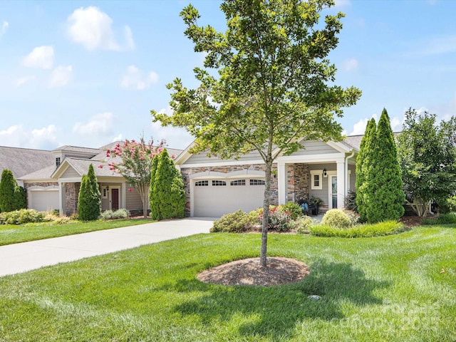 1313 Haywood Park Dr Unit 11, Waxhaw, NC 28173 - view of property hidden behind natural elements featuring stone siding, a front lawn, a garage, and driveway