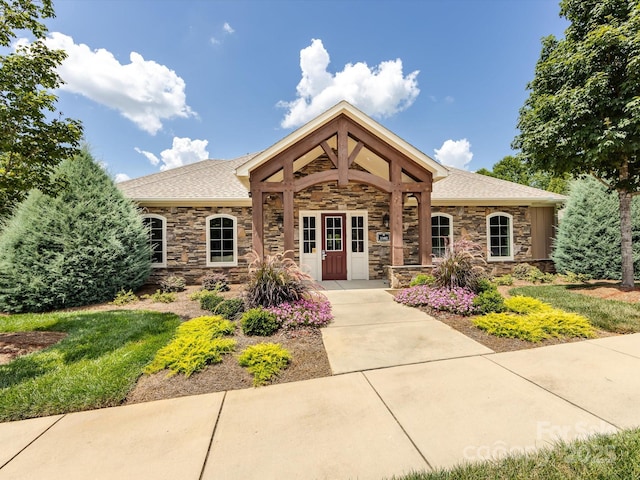 1313 Haywood Park Dr Unit 11, Waxhaw, NC 28173 - view of front of property with stone siding and a shingled roof