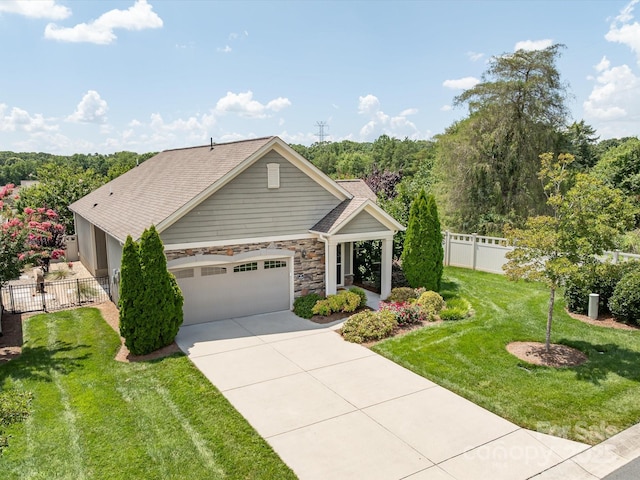 1313 Haywood Park Dr Unit 11, Waxhaw, NC 28173 - view of front facade with a garage, driveway, stone siding, and a shingled roof