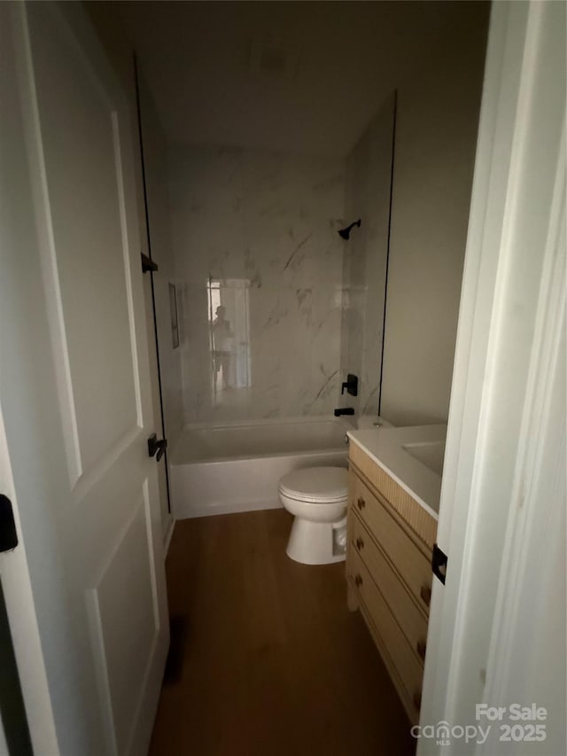 613 3rd Street Pl SW, Conover, NC 28613 - bathroom featuring vanity,  shower combination, and wood finished floors