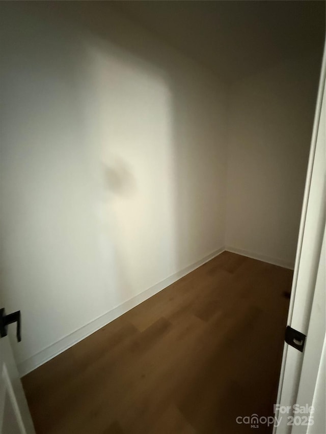 613 3rd Street Pl SW, Conover, NC 28613 - unfurnished room with wood finished floors and baseboards