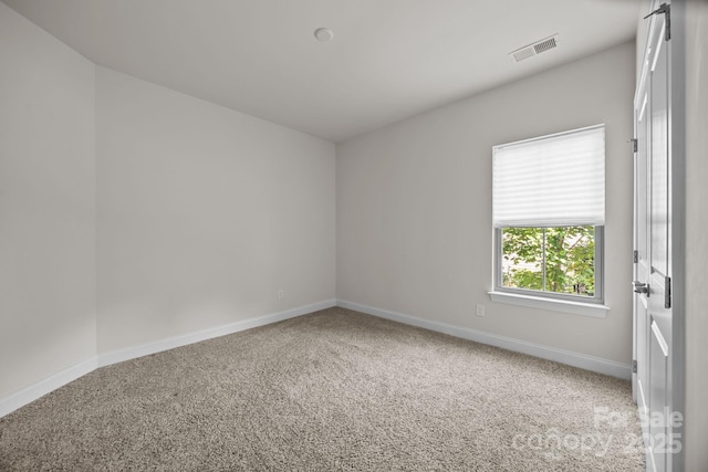 113 Chaska Loop, Troutman, NC 28166 - carpeted spare room featuring baseboards