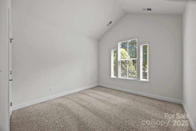 113 Chaska Loop, Troutman, NC 28166 - carpeted empty room featuring baseboards and vaulted ceiling