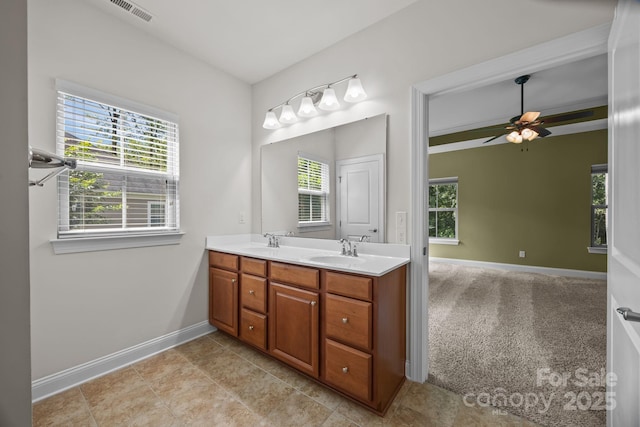 113 Chaska Loop, Troutman, NC 28166 - bathroom featuring double vanity and a ceiling fan