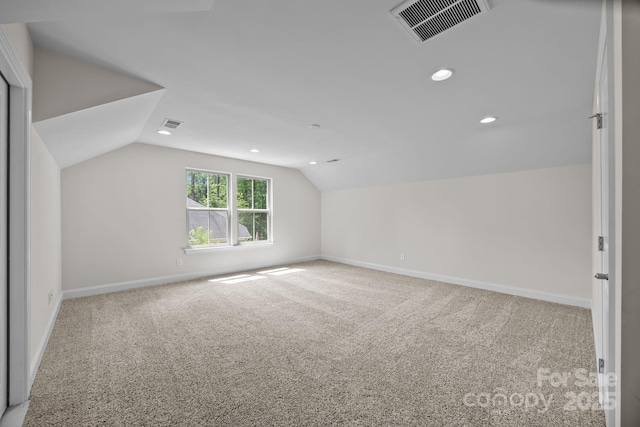 113 Chaska Loop, Troutman, NC 28166 - additional living space featuring carpet flooring, vaulted ceiling, and recessed lighting