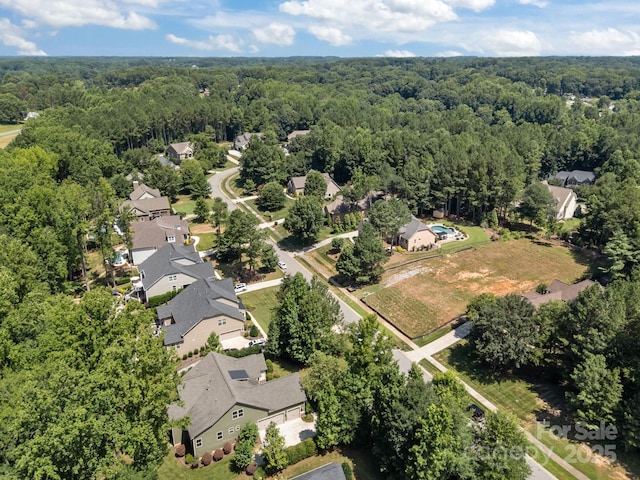 113 Chaska Loop, Troutman, NC 28166 - aerial perspective of suburban area featuring a forest