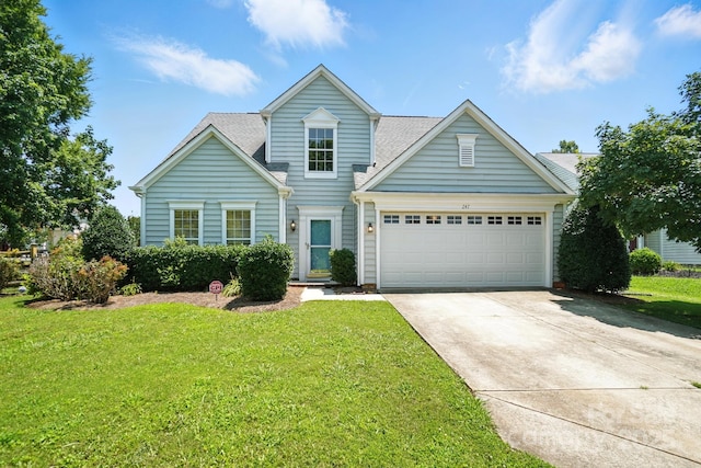 247 Aylesbury Ln, Indian Trail, NC 28079 - traditional-style house featuring concrete driveway, an attached garage, and a front yard