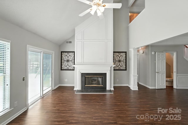 247 Aylesbury Ln, Indian Trail, NC 28079 - unfurnished living room with high vaulted ceiling, ceiling fan, wood finished floors, and a fireplace
