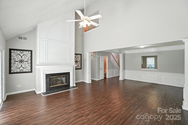 247 Aylesbury Ln, Indian Trail, NC 28079 - unfurnished living room with a fireplace, a ceiling fan, wood finished floors, stairway, and high vaulted ceiling