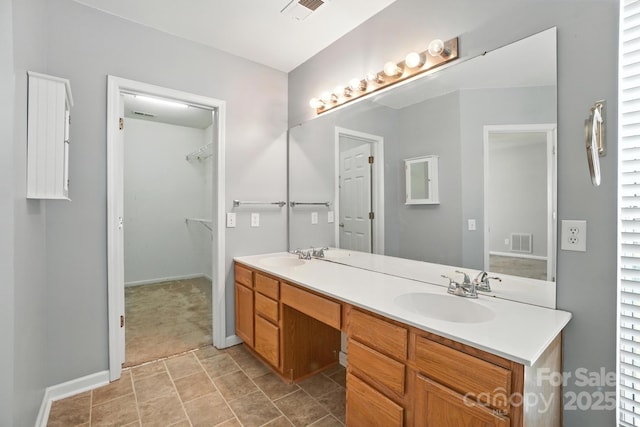 247 Aylesbury Ln, Indian Trail, NC 28079 - full bathroom with double vanity and a walk in closet