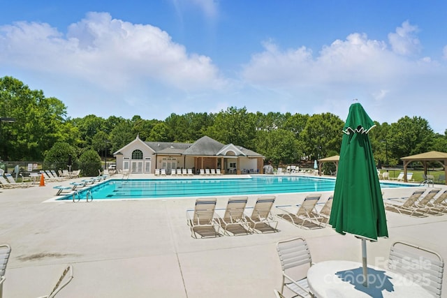 247 Aylesbury Ln, Indian Trail, NC 28079 - community pool with a patio and view of wooded area