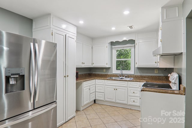 1416 Roy Dula Pl SW, Lenoir, NC 28645 - kitchen featuring stainless steel fridge, white electric range oven, white cabinetry, dark countertops, and recessed lighting