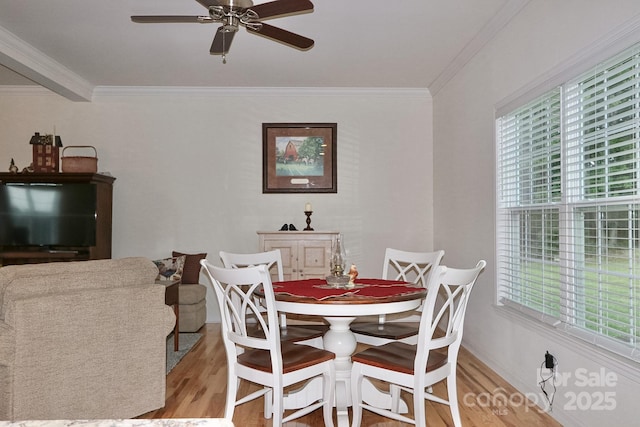 485 Calloway Rd, Lowgap, NC 27024 - dining area with light wood-style floors, crown molding, and a ceiling fan