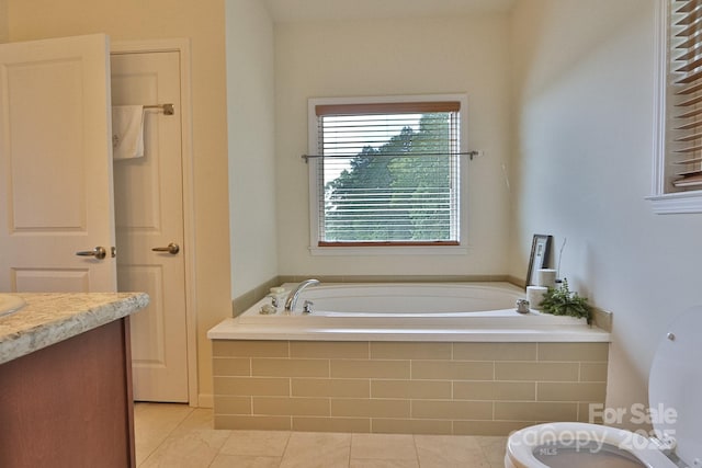 485 Calloway Rd, Lowgap, NC 27024 - bathroom featuring a garden tub, tile patterned flooring, and vanity