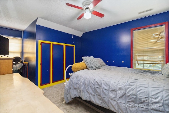 3149 Simmons St, Kannapolis, NC 28083 - carpeted bedroom featuring a textured ceiling and ceiling fan