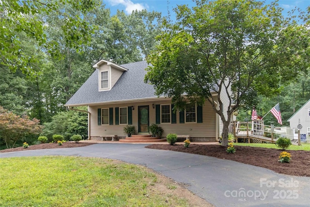 3149 Simmons St, Kannapolis, NC 28083 - new england style home featuring roof with shingles and a front yard