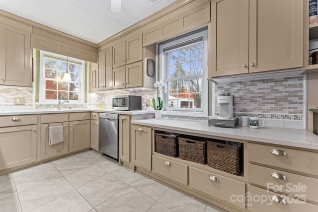 2633 Jb Denton Rd, Lancaster, SC 29720 - kitchen with appliances with stainless steel finishes, light tile patterned floors, tasteful backsplash, and light countertops