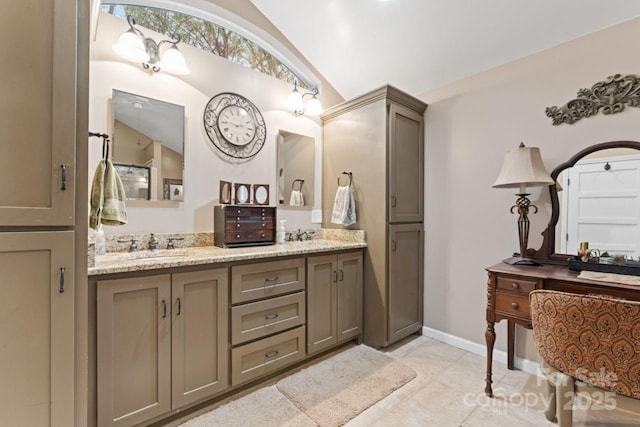 2633 Jb Denton Rd, Lancaster, SC 29720 - full bathroom featuring vaulted ceiling, double vanity, and tile patterned flooring