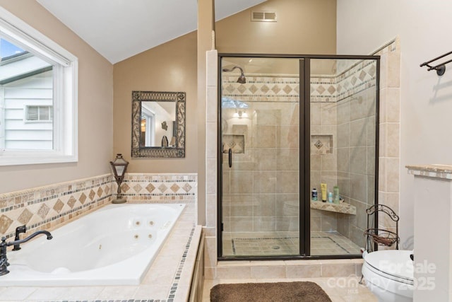 2633 Jb Denton Rd, Lancaster, SC 29720 - full bathroom featuring vaulted ceiling, a jetted tub, and a stall shower