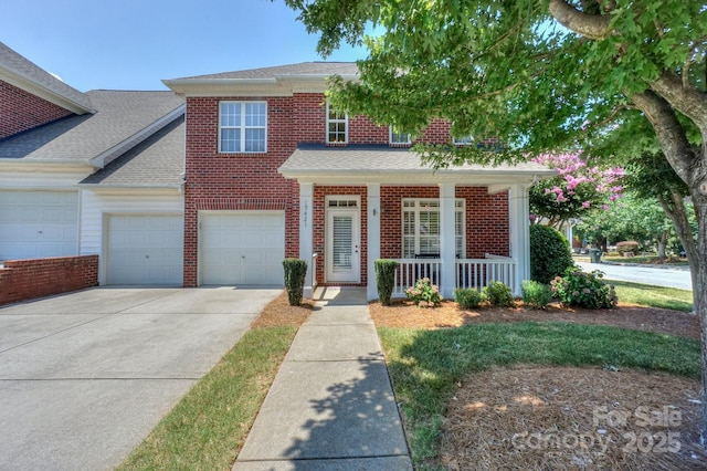 19421 Beaufain St, Cornelius, NC 28031 - view of front of property with brick siding, a porch, concrete driveway, and an attached garage