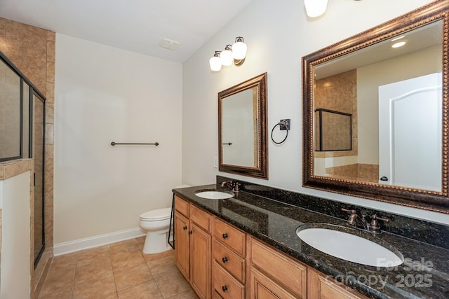 19421 Beaufain St, Cornelius, NC 28031 - bathroom featuring a stall shower, double vanity, and tile patterned flooring
