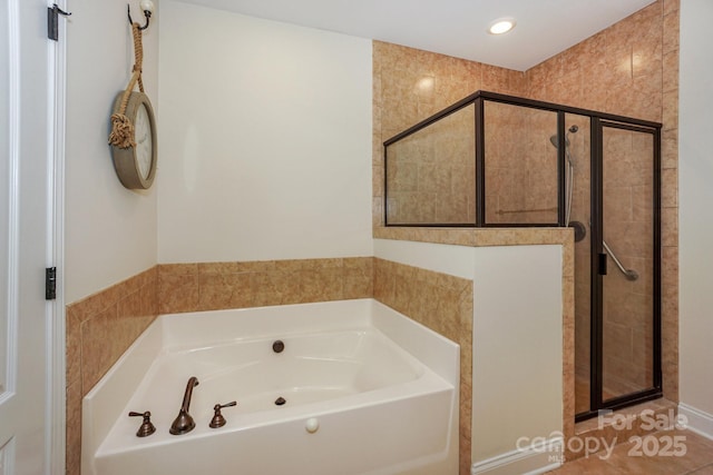19421 Beaufain St, Cornelius, NC 28031 - bathroom with a garden tub, a shower stall, and recessed lighting