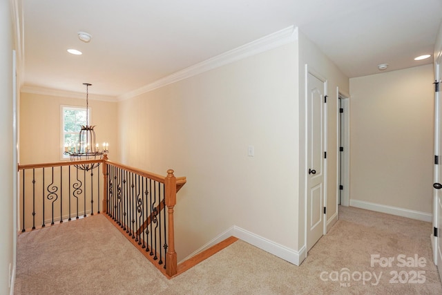 19421 Beaufain St, Cornelius, NC 28031 - hallway with an upstairs landing, a chandelier, carpet flooring, ornamental molding, and recessed lighting