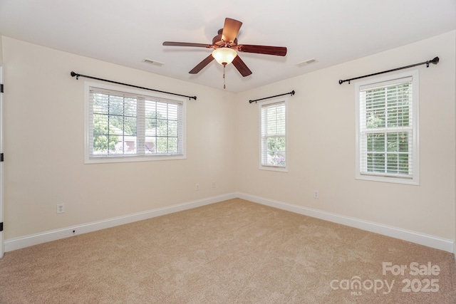 19421 Beaufain St, Cornelius, NC 28031 - carpeted spare room with baseboards and ceiling fan