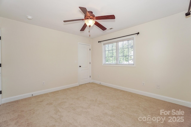 19421 Beaufain St, Cornelius, NC 28031 - empty room featuring carpet floors, ceiling fan, and a smoke detector