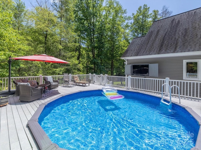 7376 NC-181 Hwy, Morganton, NC 28655 - view of swimming pool with an outdoor hangout area, a wooden deck, and view of scattered trees