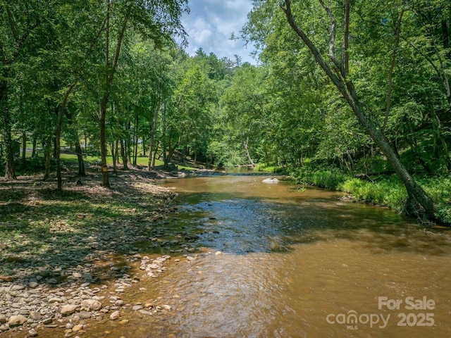 7376 NC-181 Hwy, Morganton, NC 28655 - water view featuring a heavily wooded area