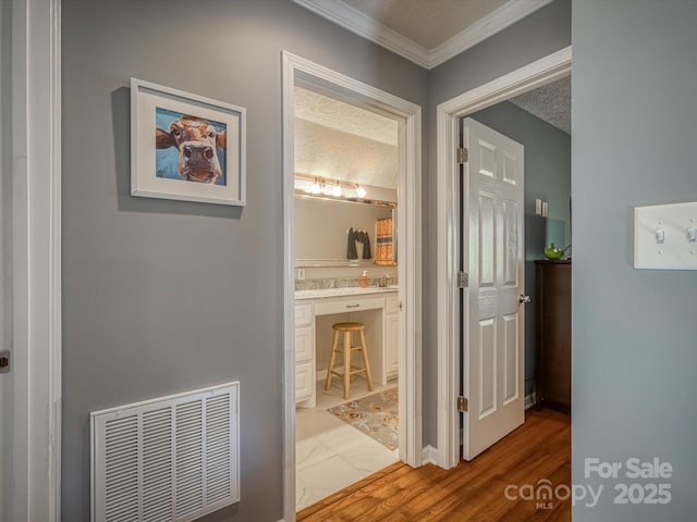 7376 NC-181 Hwy, Morganton, NC 28655 - corridor featuring crown molding and light marble finish flooring