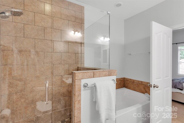 20234 Middletown Rd, Cornelius, NC 28031 - full bath featuring connected bathroom, a bath, and a tile shower