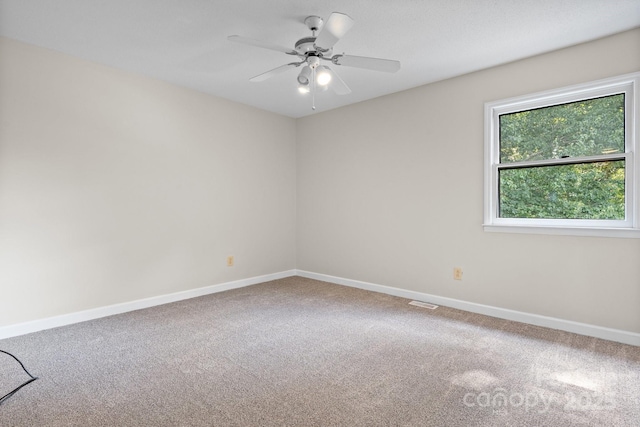 2705 N Center St Unit 76, Hickory, NC 28601 - unfurnished room featuring carpet flooring and a ceiling fan