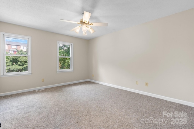 2705 N Center St Unit 76, Hickory, NC 28601 - empty room featuring carpet floors and ceiling fan
