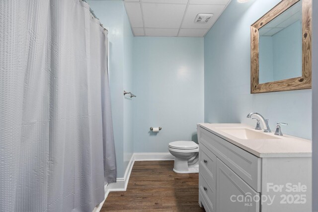 2705 N Center St Unit 76, Hickory, NC 28601 - full bathroom featuring vanity, wood finished floors, a drop ceiling, and a shower with shower curtain
