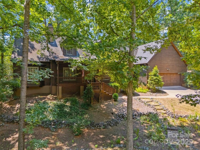 12 Woodvine Ln, Lake Wylie, SC 29710 - view of yard with a garage, stairs, driveway, and a wooden deck