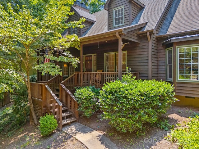 12 Woodvine Ln, Lake Wylie, SC 29710 - doorway to property with a shingled roof and a chimney