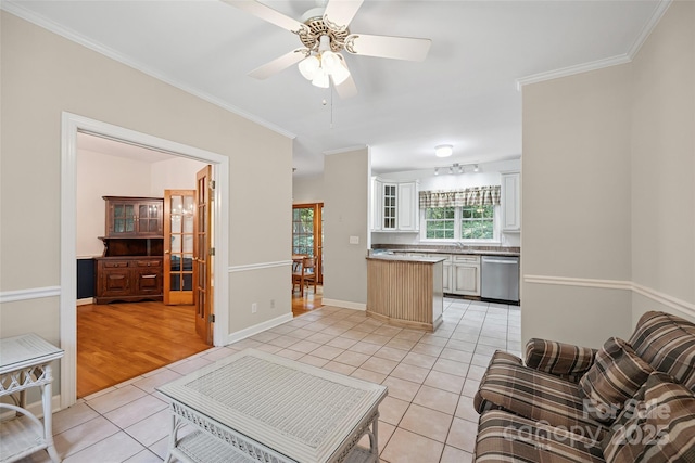 12 Woodvine Ln, Lake Wylie, SC 29710 - living room featuring light tile patterned flooring, crown molding, and a ceiling fan