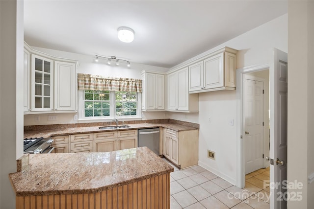 12 Woodvine Ln, Lake Wylie, SC 29710 - kitchen with appliances with stainless steel finishes, light stone countertops, light tile patterned flooring, a peninsula, and glass insert cabinets
