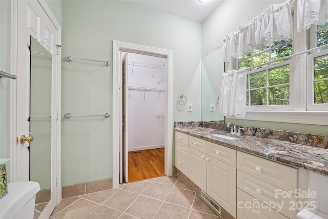 12 Woodvine Ln, Lake Wylie, SC 29710 - full bathroom with vanity, tile patterned floors, and a spacious closet
