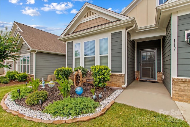 117 Cup Chase Dr, Mooresville, NC 28115 - property entrance with board and batten siding