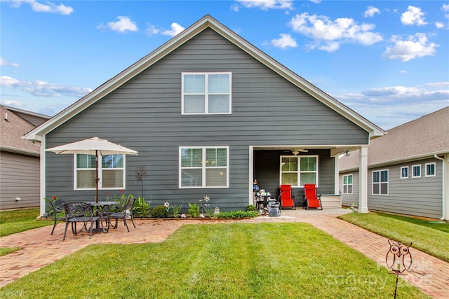 117 Cup Chase Dr, Mooresville, NC 28115 - rear view of house with a patio area, a ceiling fan, and a yard